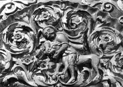 Детайл от подиконните табли на “Малкият роженски иконостас” в католикона на Роженския манастир. Сцена от Стария завет “Самсон разкъсва пастта на лъва”